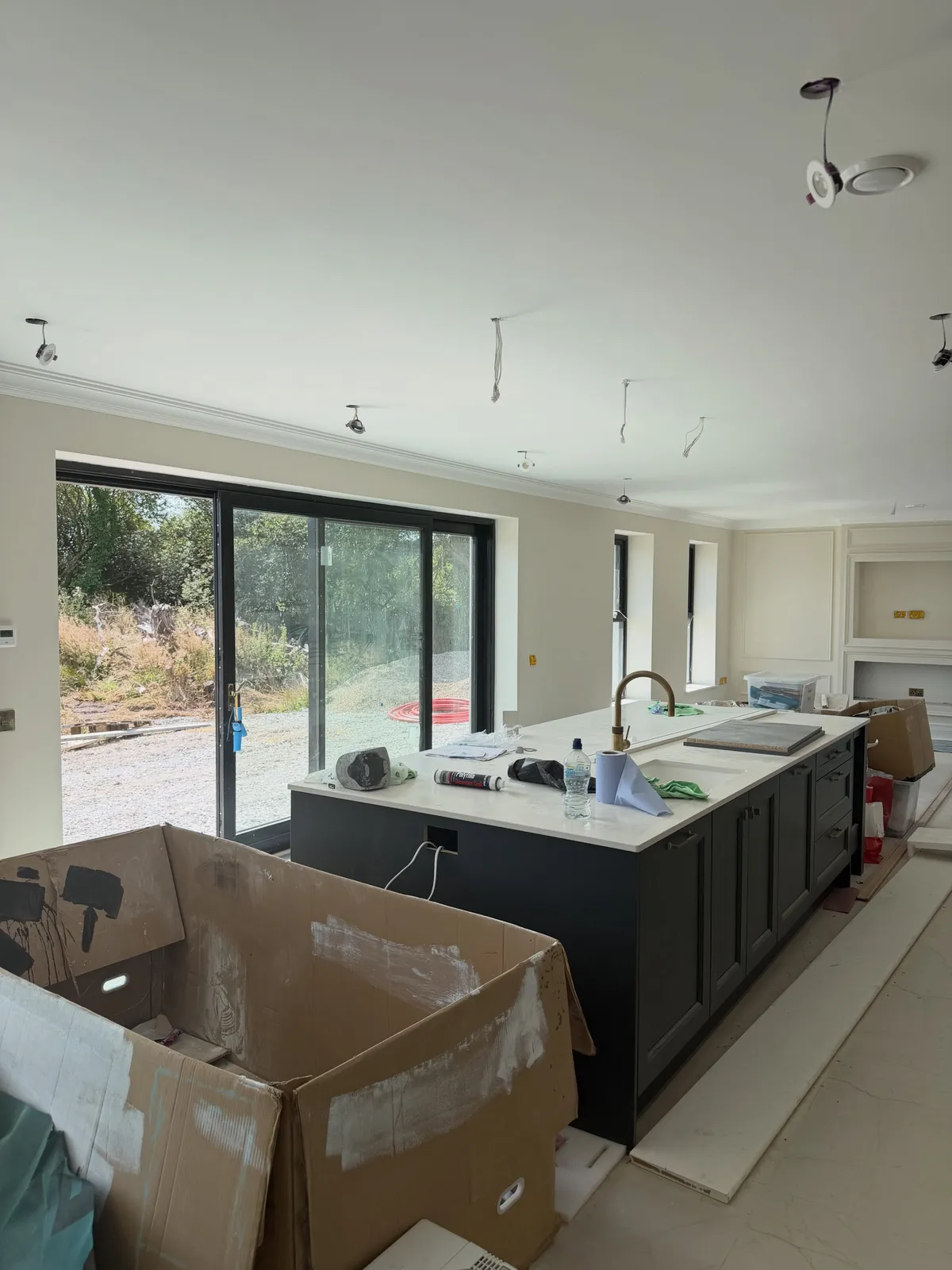 Open plan kitchen and living space decorated in Cork